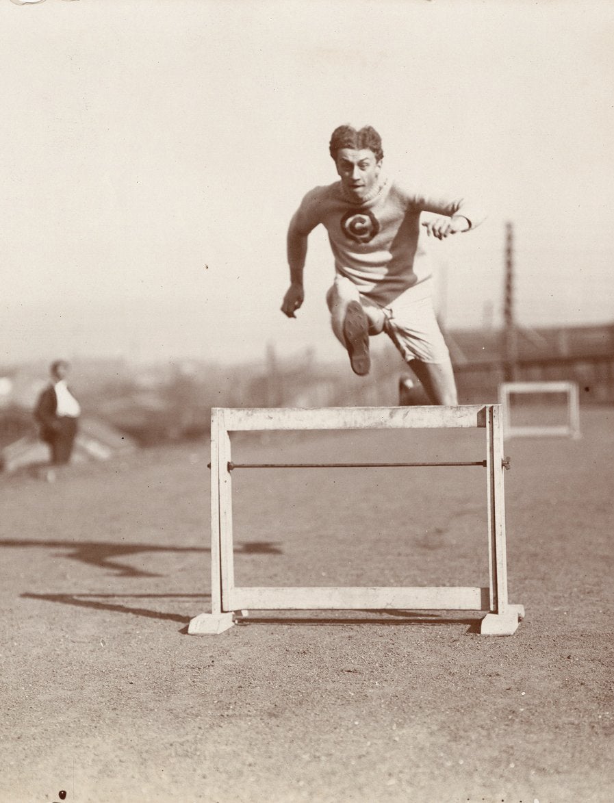 Alvin Christian Kraenzlein running the hurdles, c. 1900