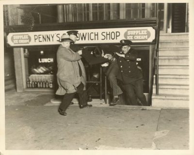 Rowbottom, student arrested at shop, 1930