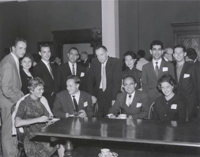 Foreign students with John F. Melby, Director of Foreign Students, at a reception and tea for foreign students , 1960