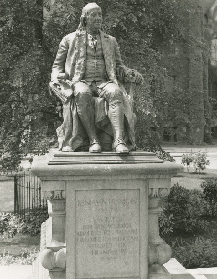 Statue of Benjamin Franklin by John J. Boyle in front of College Hall